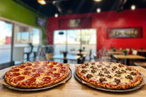 #1 - Two 16" Pizza + 1 topping Each